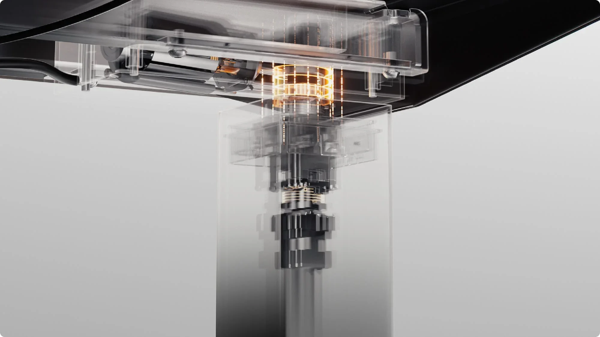 Wide X-ray render of a lifting column and motor housing with a glowing copper coil under a black desktop; no text.