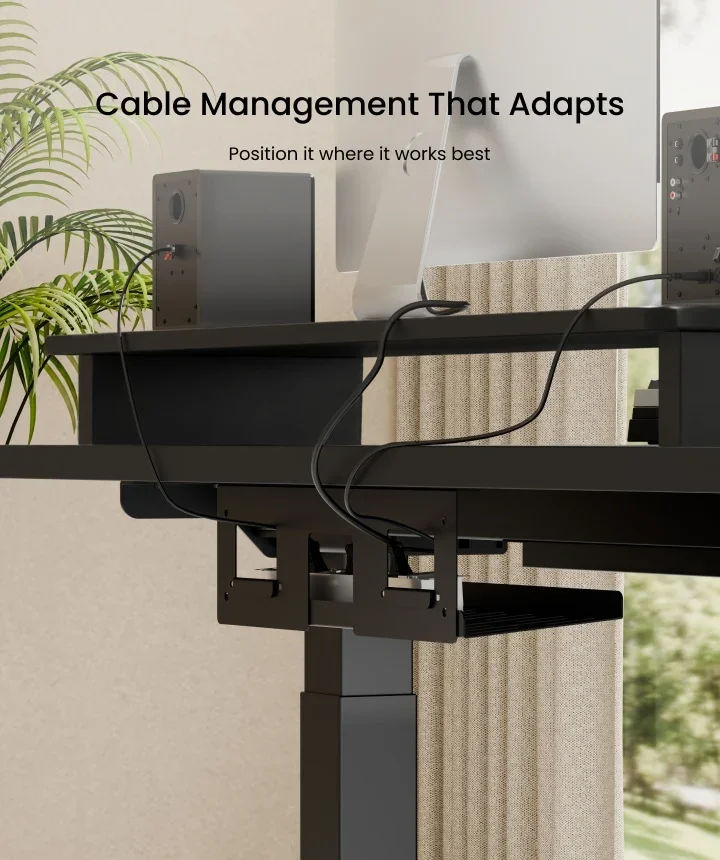 An under-desk cable tray and clamp holding cables beneath an E7L top, with "Cable Management That Adapts" headline.