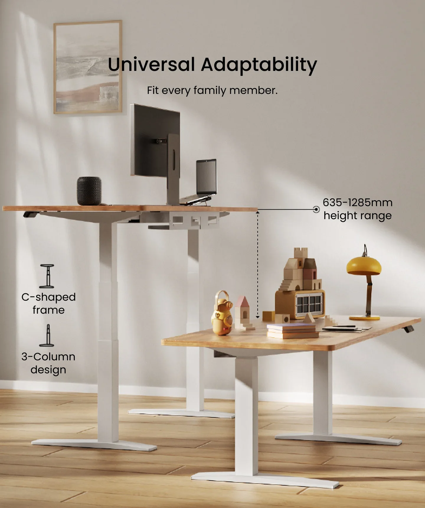 Two white C-frame desks at standing and child height with a 635–1285mm height-range callout and C-frame / 3-column icons.