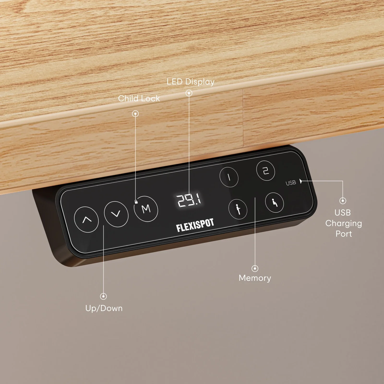 The black FlexiSpot keypad under a light oak top showing a digital height readout, arrows and memory buttons, with small callout labels for each function.