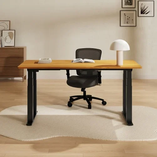 E7 Plus with a bamboo top, mushroom lamp and black mesh chair on a rug in a home office.
