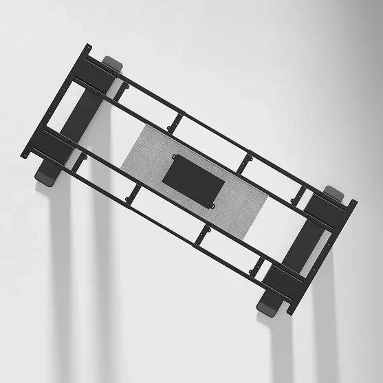 Top-down view of the black E7 Plus Max four-leg frame without a desktop, showing the crossbars and central control box on a light background.